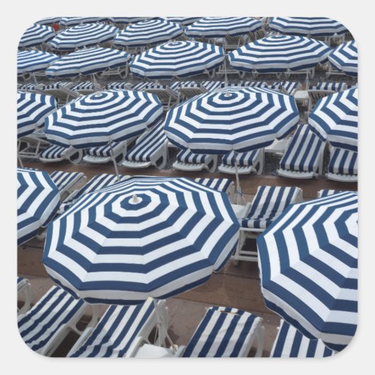 Sticker Carré Rows of Striped Beach Umbrellas With Sun Beds (Devant)