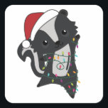 Sticker Carré Skunk Christmas<br><div class="desc">Les Skunk pour Christmas with fairy lights. Funny animals with toxits and snow to the holidays. Donc Funny for Christmas in July. Stinkiers are sweet animals and perfect for Christmas.</div>