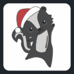 Sticker Carré Skunk Christmas Skunks Winter Animaux<br><div class="desc">La peau pour Noël avec des lumières de fées. Animaux amusants avec des cadeaux et de la neige aux vacances. Aussi drôle pour Noël en juillet. Les teinturiers sont des animaux doux et parfaits pour Noël.</div>