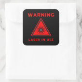 Sticker Carré Symbole d'avertissement laser rouge et noir (Sac)