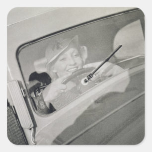 Sticker Carré Une femme au volant, vers 1930 (photogravure)