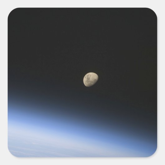 Sticker Carré Une lune géante visible au-dessus de l'atmosphère  (Devant)