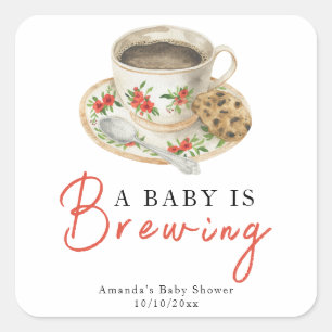 Sticker Carré Une tasse de café Baby Shower Un bébé est en train