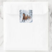 Sticker Carré Wild Horses Running Through a Snowy Forest (Sac)
