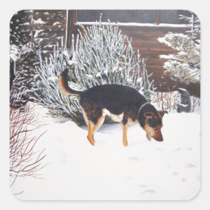 Sticker Carré Winter snow scene with cute black and tan dog