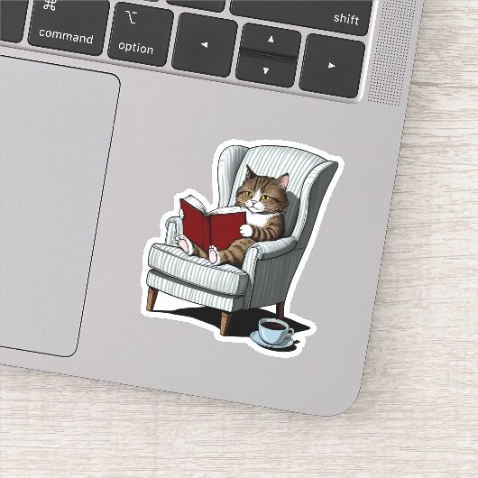 Sticker Chat confortable avec livre et café (Détail)