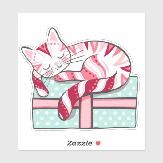 Sticker Chat couché sur un cadeau de Noël (Feuille)