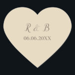 Sticker Cœur Belle et classe Mariage<br><div class="desc">Complétez votre papeterie mariage avec classe en utilisant ces autocollants de forme cardiaque. Elles sont ornées d'un arrière - plan beige avec du texte écrit en belle police marron. Customisez votre nom et votre date de mariage également en police marron. Commandez vos autocollants de mariage dès aujourd'hui ! Sticker mariage...</div>