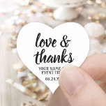 Sticker Cœur Love & Merci Noir & Blanc Simple Élégant Script<br><div class="desc">Ajoutez une touche personnalisée aux faveurs, décorations et notes de remerciement avec des autocollants personnalisés "amour et merci" en forme de coeur. Tout le libellé de ce modèle est simple à customiser pour les scellés d'enveloppe ou les étiquettes cadeaux. Le design noir et blanc présente une calligraphie de script moderne...</div>