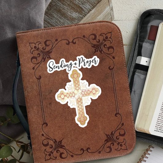 Sticker Croix d'or envoyant une prière