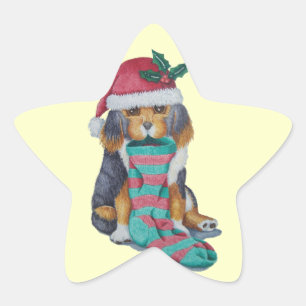 Sticker Étoile chiot noir et brun mignon vêtu pour noël