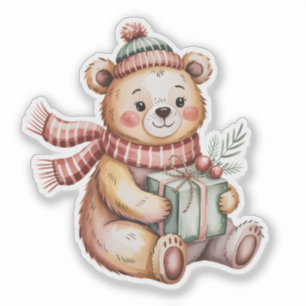 Sticker Joli ours en peluche de Noël tenant un cadeau en a