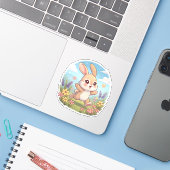 Sticker Lapin mignon sautant dans un champ de fleurs (Ordinateur portable avec iPhone)