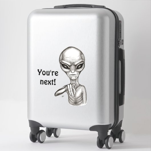 Sticker Mauvais Alien, Tu es le prochain ! (Sur valise)