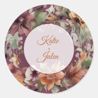 Sticker met bloemmotief en naam in cirkel