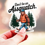 Sticker Ne soyez pas un Assquatch Funny Bigfoot Vinyl<br><div class="desc">Ce design amusant inspiré de Bigfoot avec l'expression "Ne sois pas un Assquatch" est parfait pour toute personne ayant un sens de l'humour et un amour pour le plein air. Fabriqué avec du vinyle durable, cet autocollant est une excellente façon d'ajouter une touche de personnalité à votre voiture, bouteille d'eau...</div>