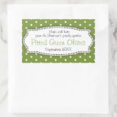 Sticker op het etiket van groene olijven (Tas)