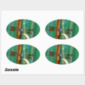 Sticker Ovale A teal Eyed Dragonfly with cattails (Feuille)
