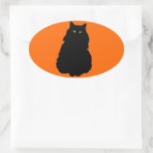 Sticker Ovale Assis noir chat Silhouette sur orange (Sac)