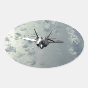 Sticker Ovale Avion au-dessus des mers