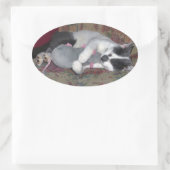 Sticker Ovale Chaton couchant (Sac)