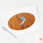 Sticker Ovale Chrome Marlin sur bois de teck (Enveloppe)