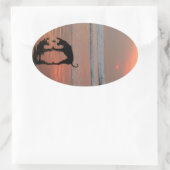 Sticker Ovale Coucher de soleil de chien (Sac)