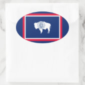 Sticker Ovale Design du drapeau d'état du Wyoming (Sac)