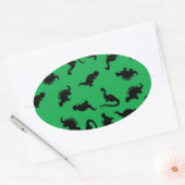 Sticker Ovale Dinosaur Silhouettes on Green Background (Enveloppe)
