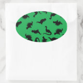 Sticker Ovale Dinosaur Silhouettes on Green Background (Sac)