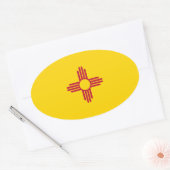 Sticker Ovale Drapeau d'État du Nouveau-Mexique/Mexique (Zia), É (Enveloppe)