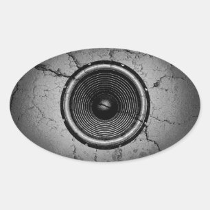 Sticker Ovale Haut-parleur de musique sur un mur fissuré