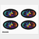 Sticker Ovale Infini vibrant avec papillon arc-en-ciel sur noir (Feuille)