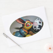 Sticker Ovale Jouet lapin et oeuf de vache (Enveloppe)