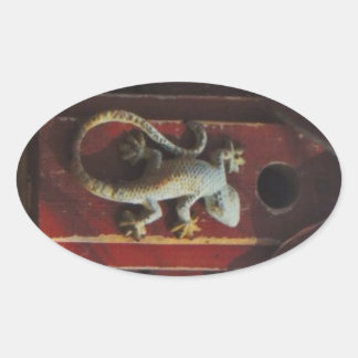 Sticker Ovale lézard gris sur bois usé