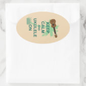 Sticker Ovale Maintenez le calme et Ukulele sur une impression a (Sac)