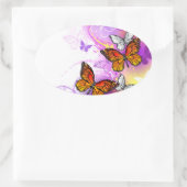 Sticker Ovale Papillons monarques sur fond violet (Sac)