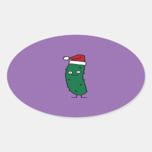 Sticker Ovale Pickle à l'aneth de Noël utilisant un casquette