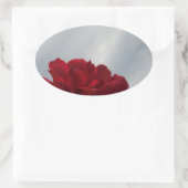 Sticker Ovale Roses rouges contre un ciel bleu vif (Sac)