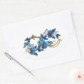 Sticker Ovale Symbole infini de papillons Morpho bleus (Enveloppe)