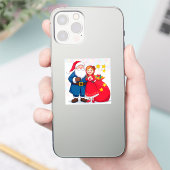 Sticker Père Noël et fille avec un sac de cadeaux (Téléphone)