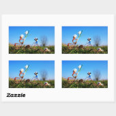 Sticker Rectangulaire 2 Fubby qui plantent une sphère de crocus. (Feuille)