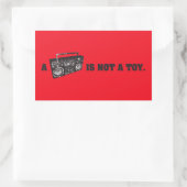 Sticker Rectangulaire Boombox n'est pas un jouet (Sac)