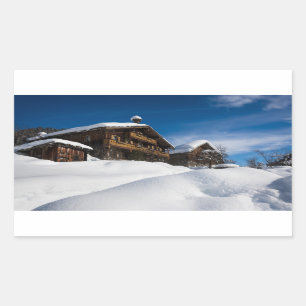 Sticker Rectangulaire cabines traditionnels en bois dans la neige