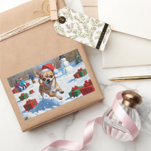 Sticker Rectangulaire Chihuahua courant dans la neige avec un chapeau de