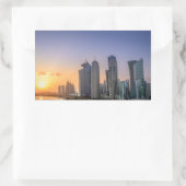 Sticker Rectangulaire Coucher de soleil sur la ville de Doha, Qatar (Sac)
