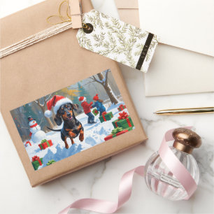 Sticker Rectangulaire Dachshund courant dans la neige avec un chapeau de