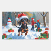Sticker Rectangulaire Dachshund Courir en neige avec Casquette de Noël (Devant)