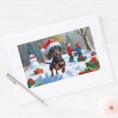 Sticker Rectangulaire Dachshund Courir en neige avec Casquette de Noël (Enveloppe)