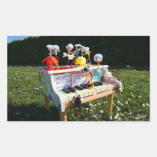 Sticker Rectangulaire Des fubby sur le piano qui font de la musique et d